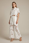 Women's Elegant Lace Two Piece Set - Cape Overlay Crop Top and Wide-Leg Trousers